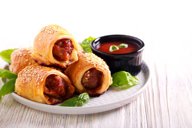 istock Mini sausage rolls with sesame on top, 1013198348