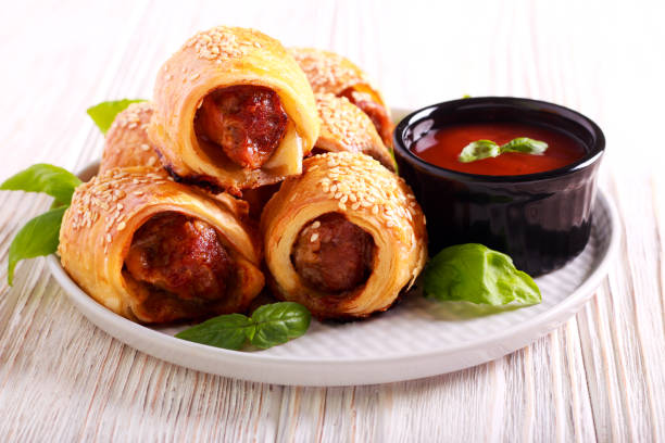 istock Mini sausage rolls with sesame on top 1013201446