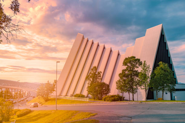 Arctic cathedral in Tromso, Norway, Scandinavia, Europe. Cloudy sunset sky in background. Architecture and religion. Arctic cathedral in Tromso, Norway, Scandinavia, Europe. Cloudy sunset sky in background. Architecture and religion. tromso stock pictures, royalty-free photos & images