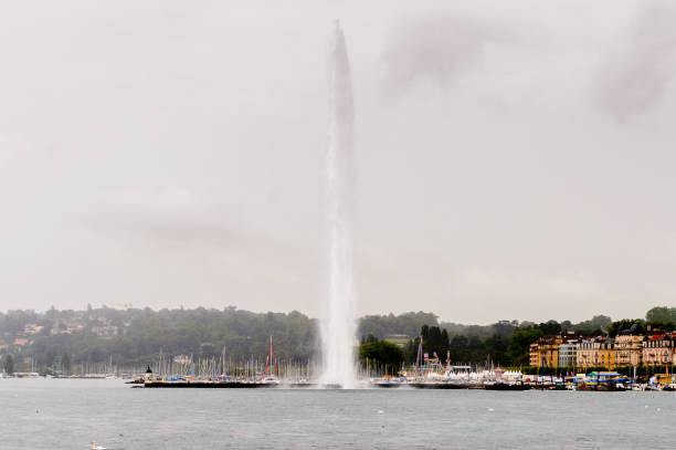 istock Fountain on the lake of Geneva 1013204776