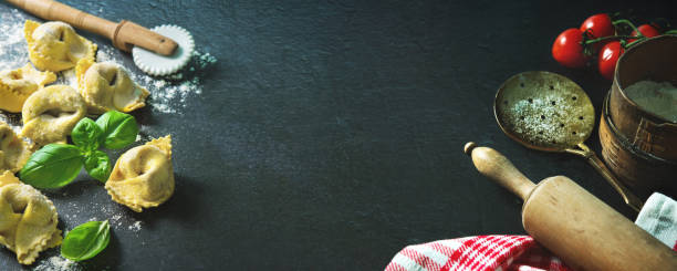 istock Homemade ravioli with spinach and ricotta on dark background 1013205110