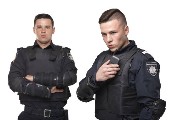 istock Cops in uniform and body armor on white background 1013207558