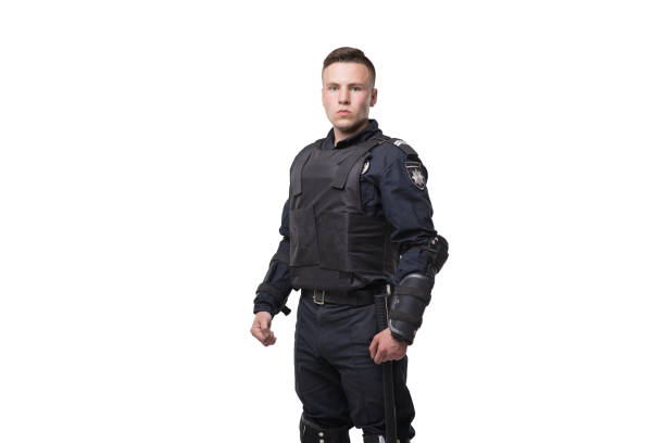 istock Armed police officer isolated on white background 1013207608