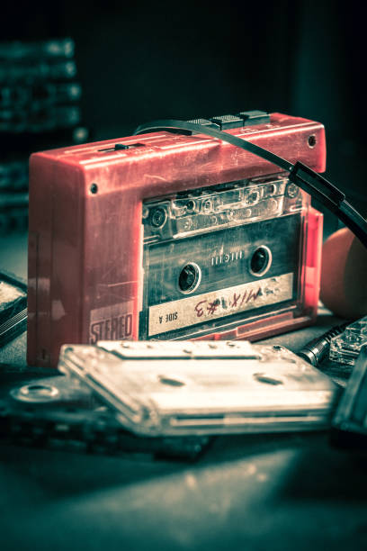 istock Vintage cassette tape with walkman and headphones 1013207752