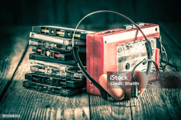 Classic Cassette Tape With Headphones Stock Photo - Download Image Now - Personal Stereo, Audio Cassette, Playing