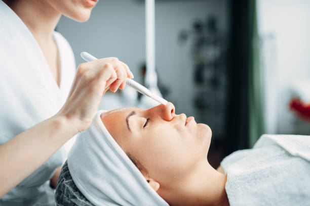 istock Beautician makes rejuvenation procedure to patient 1013208410