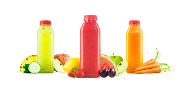 istock Three Flavors of Freshly Squeezed Fruit and Vegetable Juice in Generic Bottles Isolated on White Background 1013213030