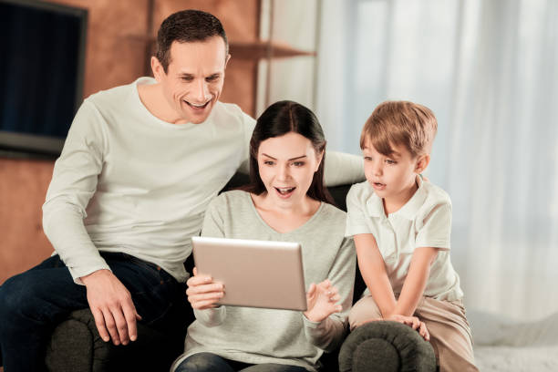 istock Pleasant young woman holding a tablet 1013216072