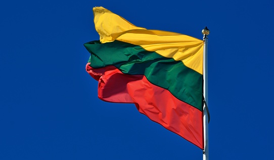 flag of Lithuania against blue sky
