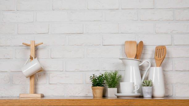 istock There are various cookers on the table, background made of bricks painted white color only. 1013229056