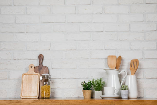 istock There are various cookers on the table, background made of bricks painted white color only. 1013229070
