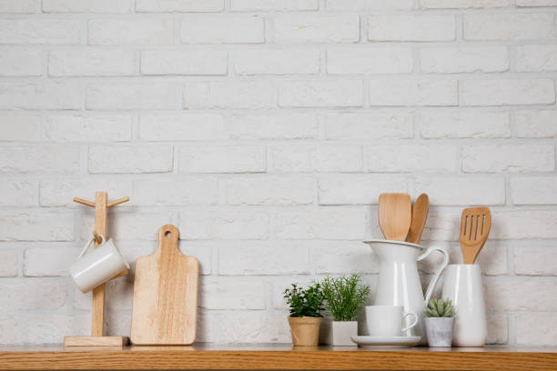 istock There are various cookers on the table, background made of bricks painted white color only. 1013229074