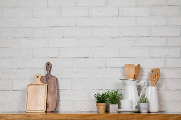 istock There are various cookers on the table, background made of bricks painted white color only. 1013229076