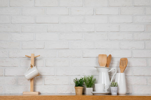 istock There are various cookers on the table, background made of bricks painted white color only. 1013229080