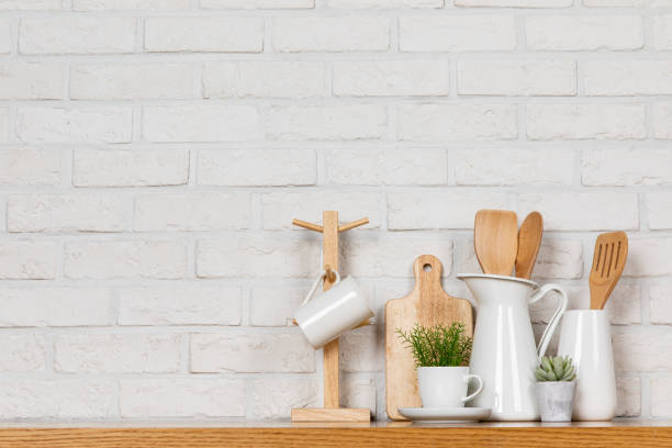 istock There are various cookers on the table, background made of bricks painted white color only. 1013229088