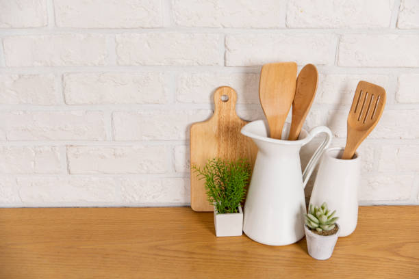 istock There are various cookers on the table, background made of bricks painted white color only. 1013229116