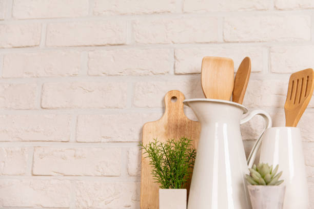 istock There are various cookers on the table, background made of bricks painted white color only. 1013229120