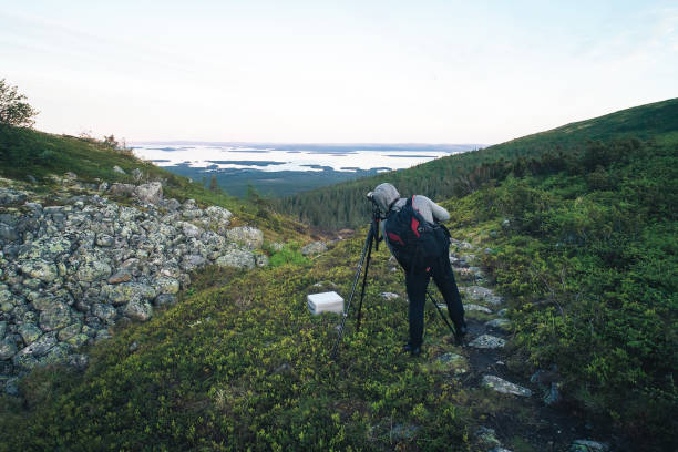istock Photographer is Shooting in the Mountains 1013264642