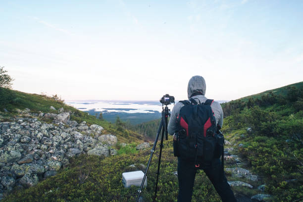 istock Photographer is Shooting in the Mountains 1013264664