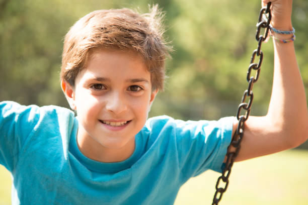 istock Multi-ethnic group of school children playing on school playground. 1013268142