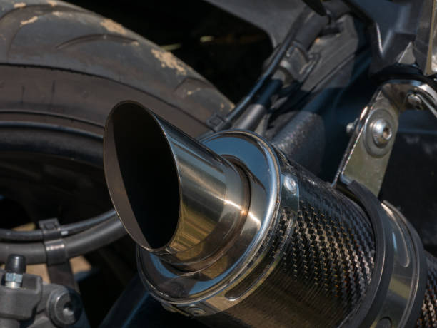 istock Close up view of a black motorcycle engine. exhaust pipe. 1013268598