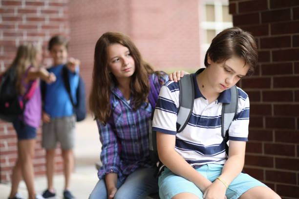 istock Comforting friend after being bullied. 1013275068