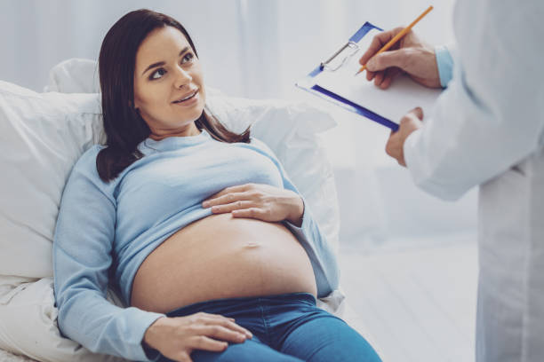 istock Amazing future mommy waiting for consultation 1013275154