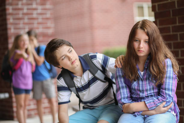 istock Comforting friend after being bullied. 1013275208