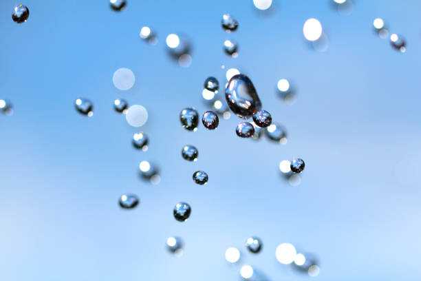 istock Close-up of water drops on glass surface as background 1013283804