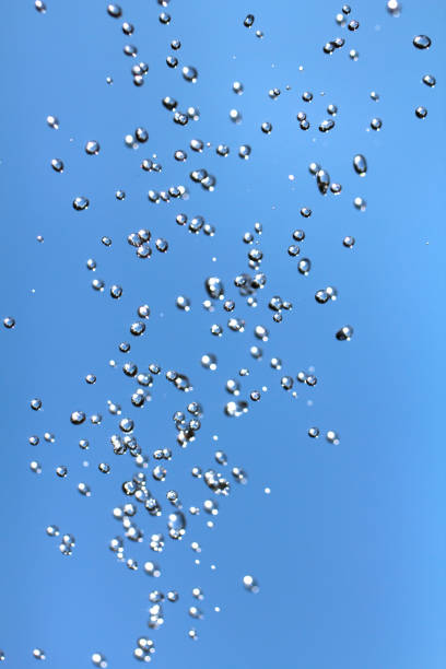 istock Close-up of water drops on glass surface as background 1013283986
