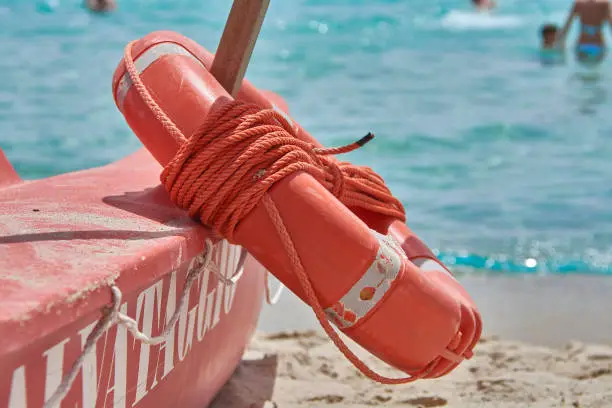 Photo of The red life buoy on the rescue boat