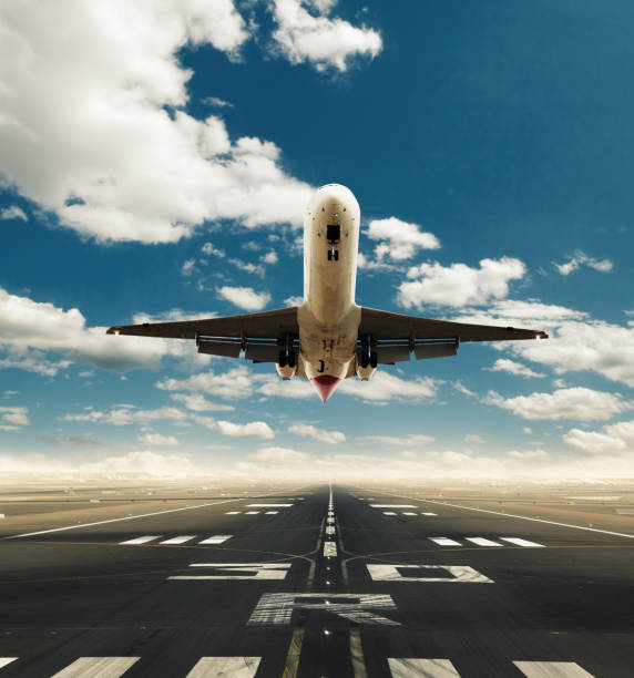 istock Commercial airplane taking off runway 1013288824