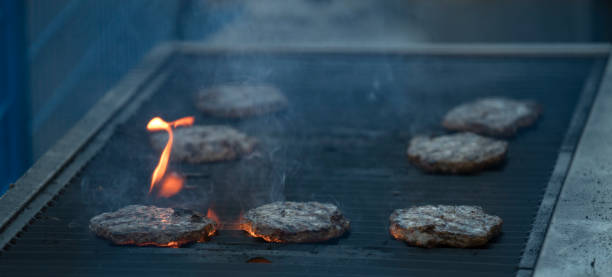 istock Barbecued hamburgers 1013324522
