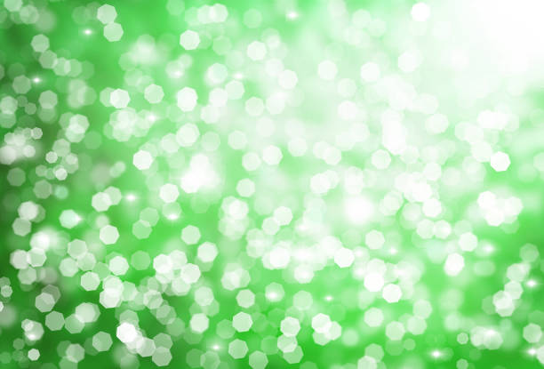istock Christmas sparkling green blurred background for design,bokeh,glitter 1013342912