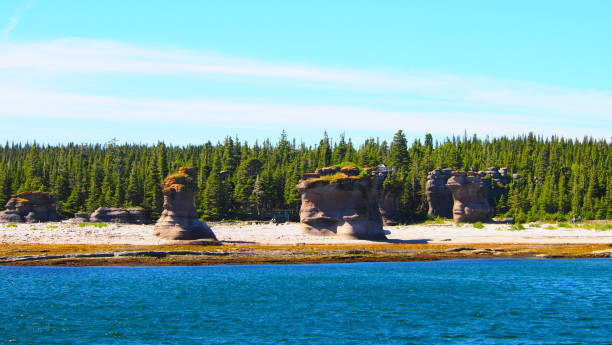 Monoliths of the Mingan Islands 1 Monoliths of the Mingan Islands Archipelago National Park Reserve on Quebec's North Shore. cote nord photos stock pictures, royalty-free photos & images