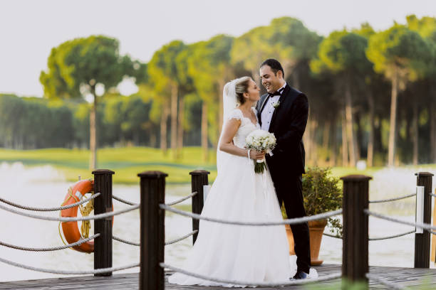 istock Bride and groom posing for wedding 1013408502