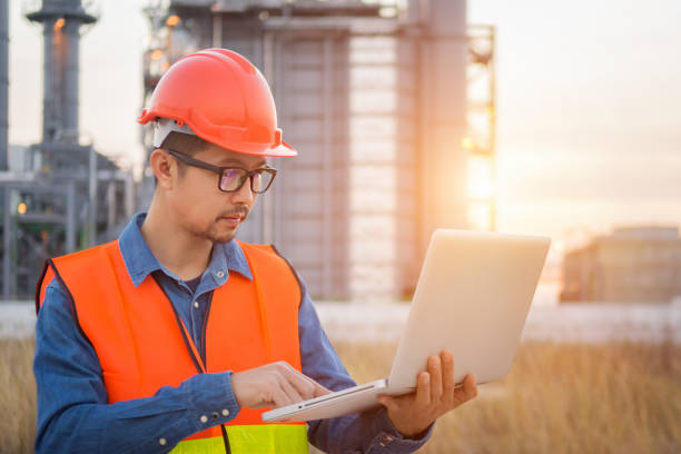 istock Service engineer working with laptop in power plant 1013414250