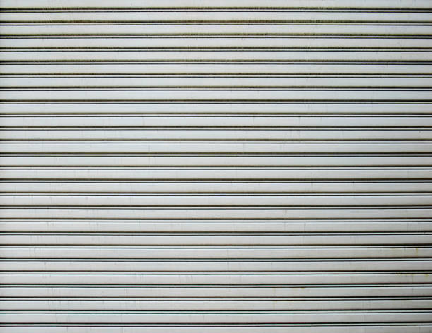 istock Corrugated metal sheet,Slide door ,Roller shutter texture 1013416874