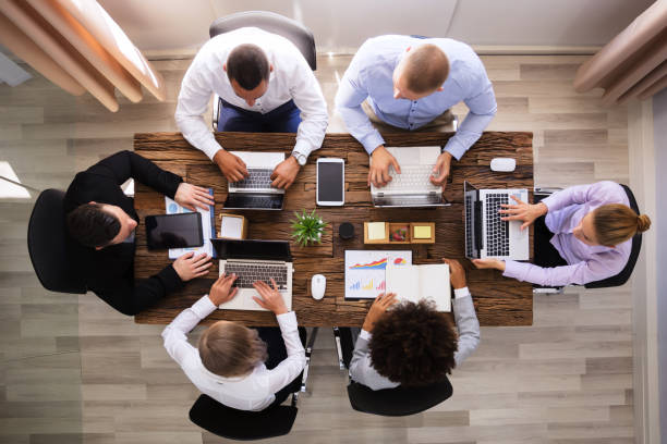 istock Group Of Businesspeople Working On Laptop 1013419820