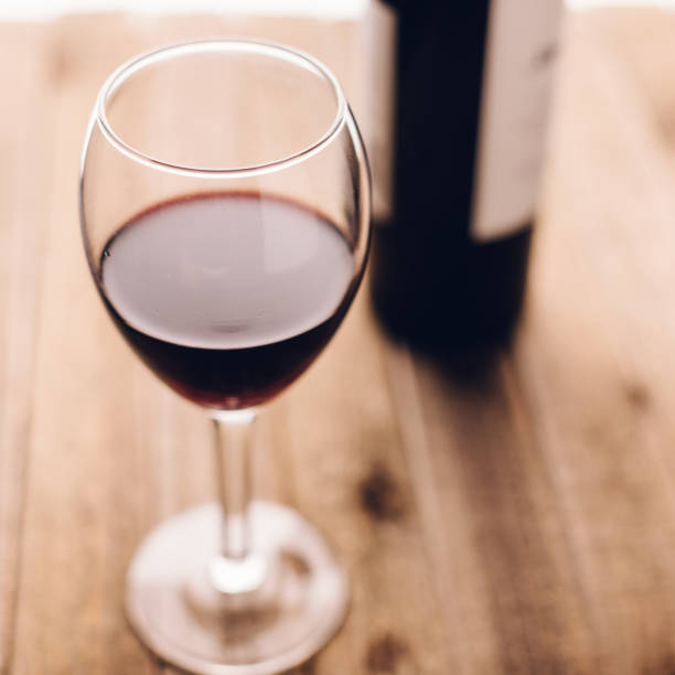 istock red wine in a glass on the table 1013424926