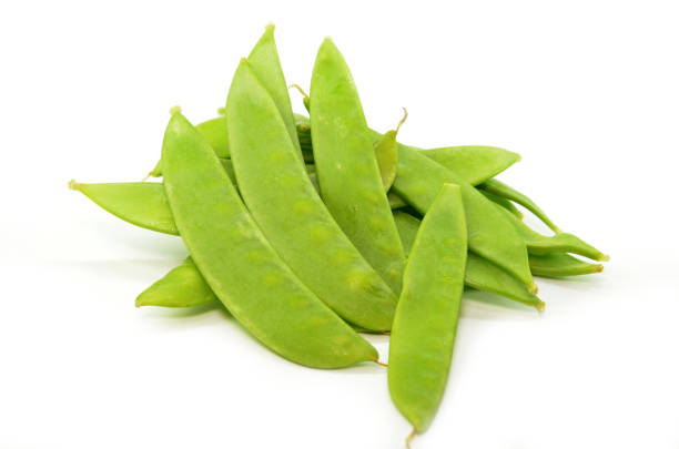 istock Pile of fresh snap peas isolated 1013424958