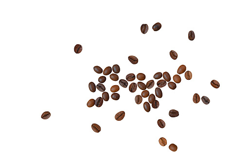 Scattered roasted coffee beans on white background, top view with clipping path. Top view of scattered roasted coffee beans.