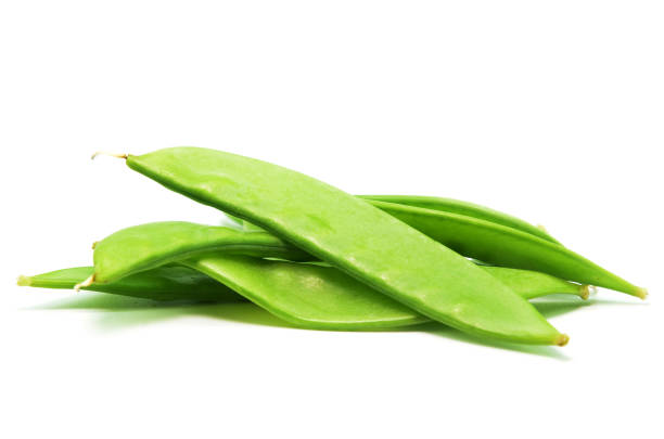 istock Pile of fresh snap peas isolated 1013427480