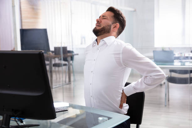 istock Businessman Suffering From Back Pain 1013432886
