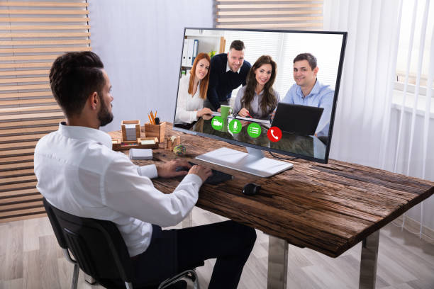 istock Businessman Video Conferencing With His Partner On Computer 1013435508
