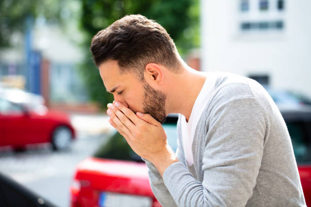 istock Man Coughing At Outdoor 1013435572