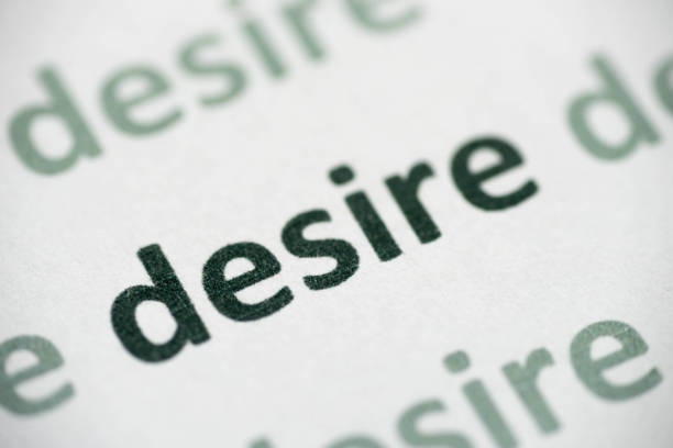 istock word desire printed on paper macro 1013438150