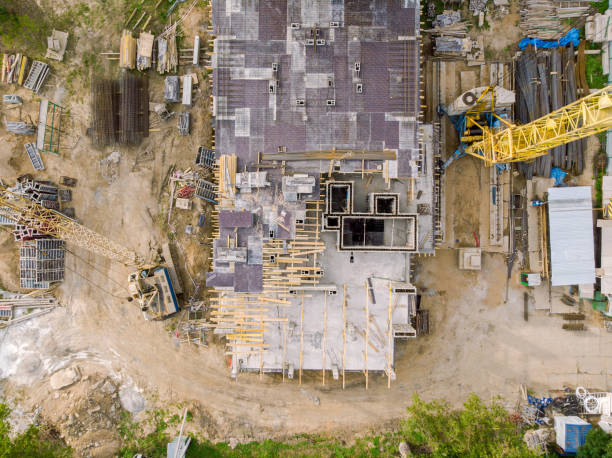 istock building construction site in progress with tower crane. aerial view 1013440362
