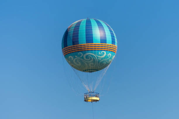 istock Hot air balloons flying on the blue sky 1013442680