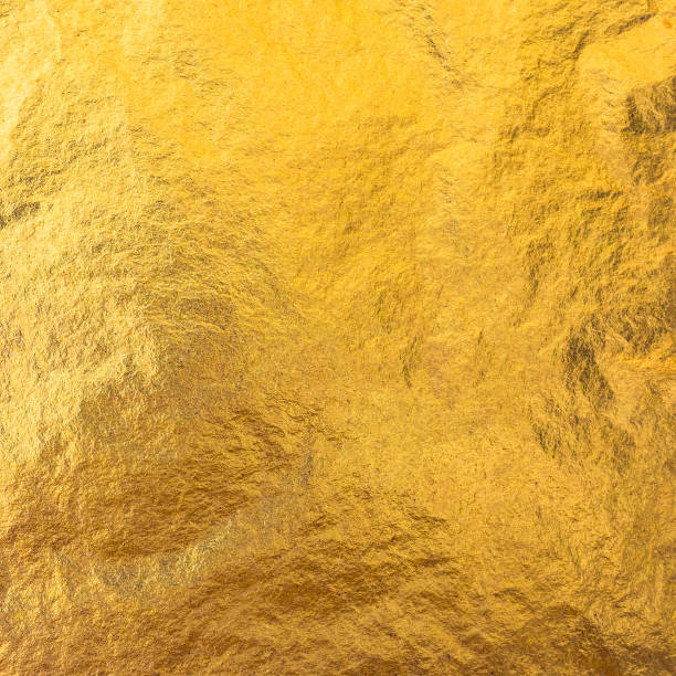 istock Gold foil leaf metallic wrapping paper shiny texture background for wall paper decoration element 1013457730